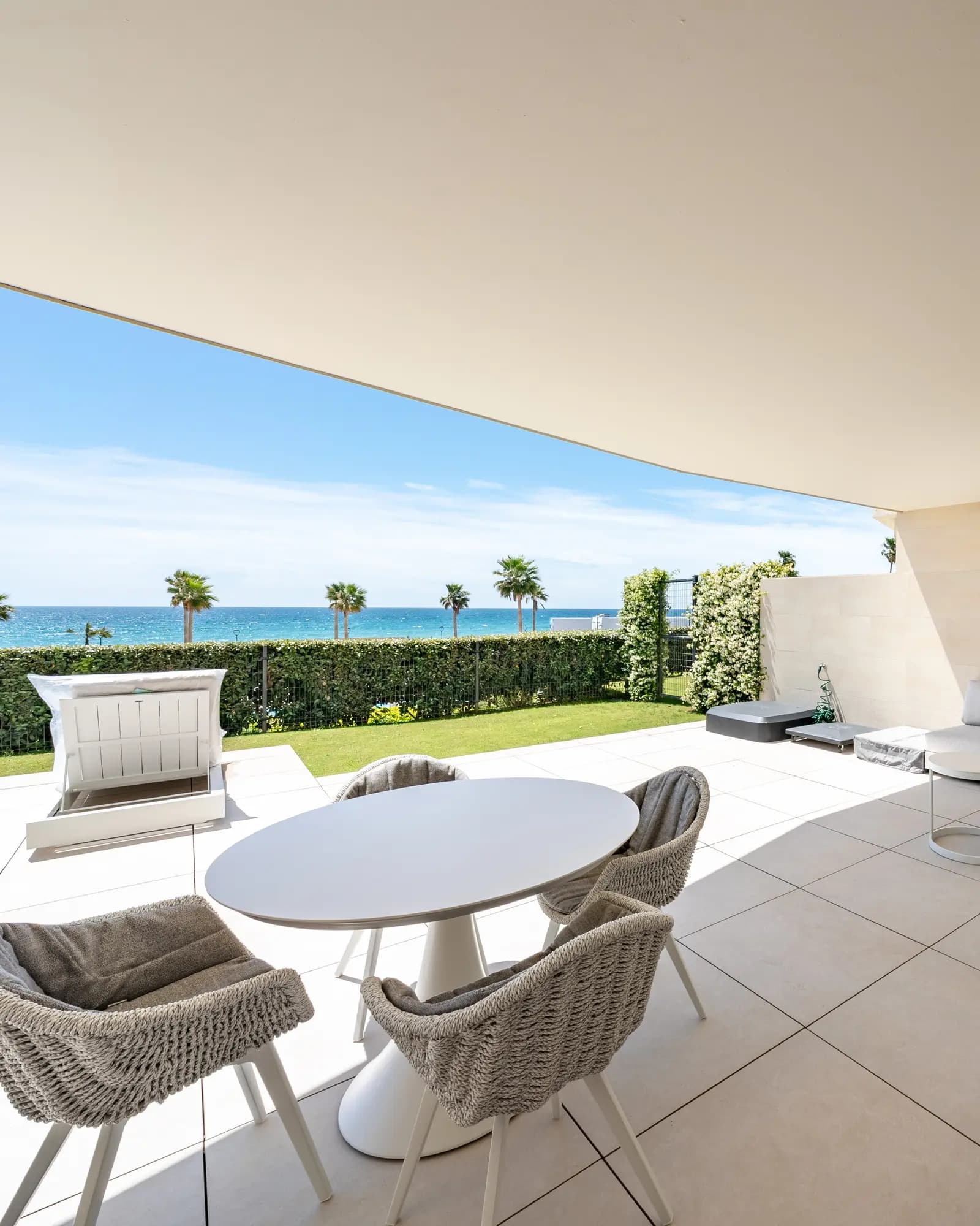 Contemporary coastal terrace with a wide view over the sea